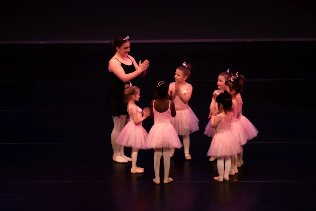 Young kids in tutus during dance lesson