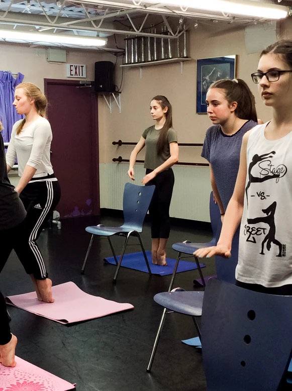 Dancers in an Alixa flexibility class
